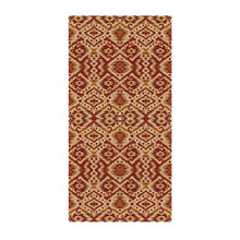 Load image into Gallery viewer, Patterned tablecloth with red and beige ikat pattern on a white background