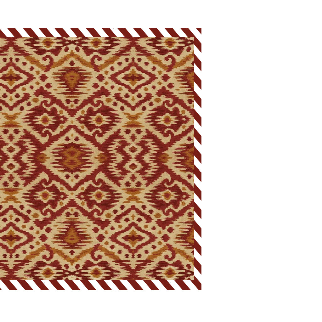 Patterned cloth napkin with red and beige ikat design on a white background