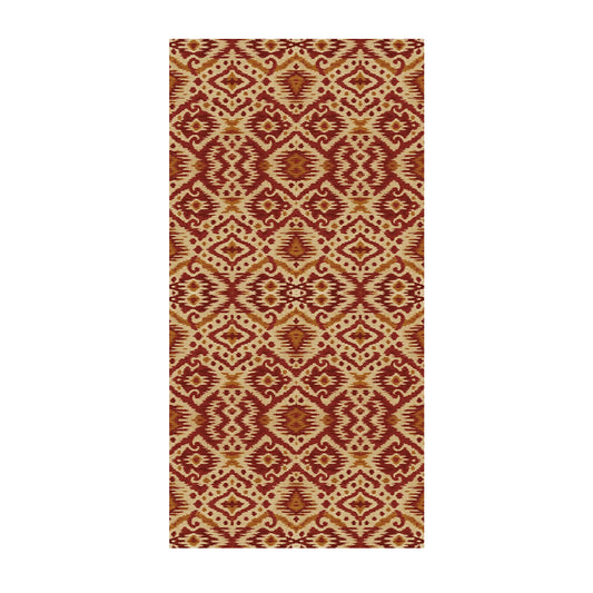 Patterned tablecloth with red and beige ikat pattern on a white background