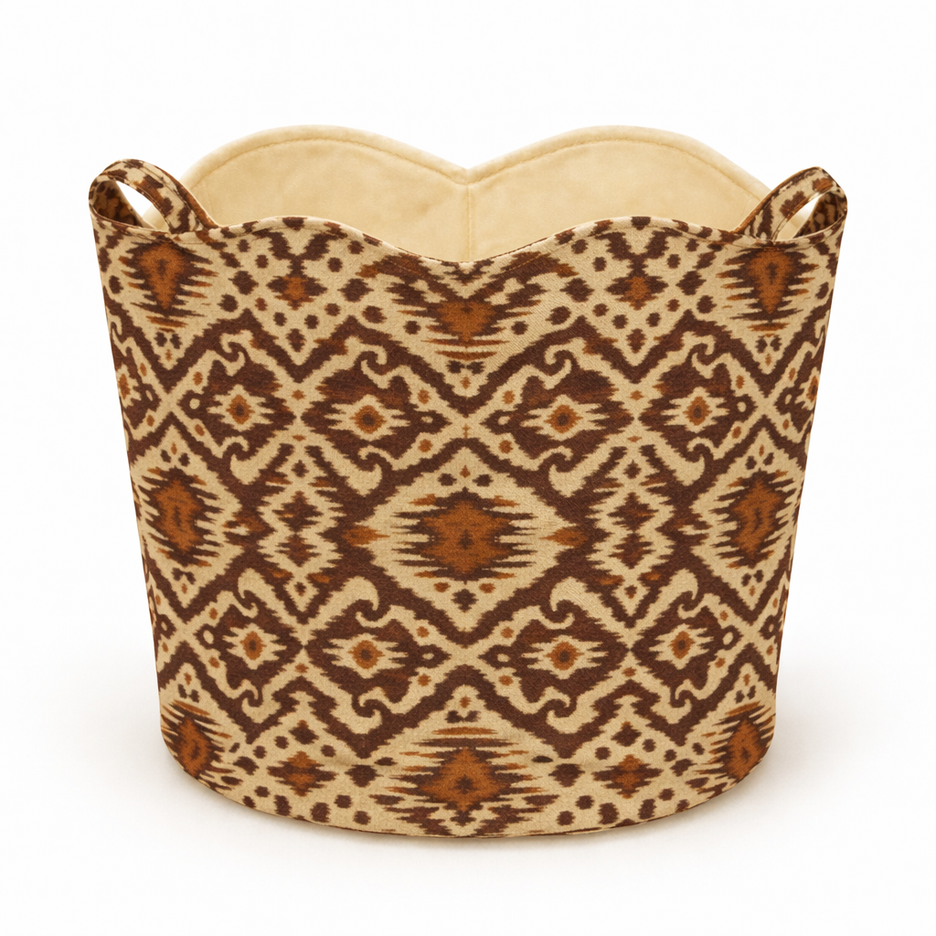 Ikat brown and beige patterned basket tote bag with handles on the side a white background
